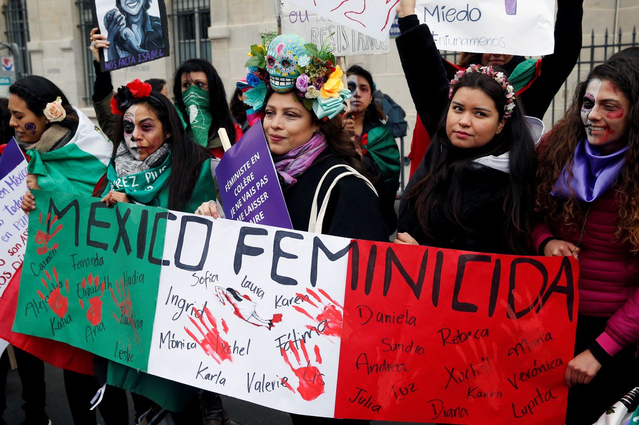 Mexican women protest against femicide in Mexico during a protest in Paris.