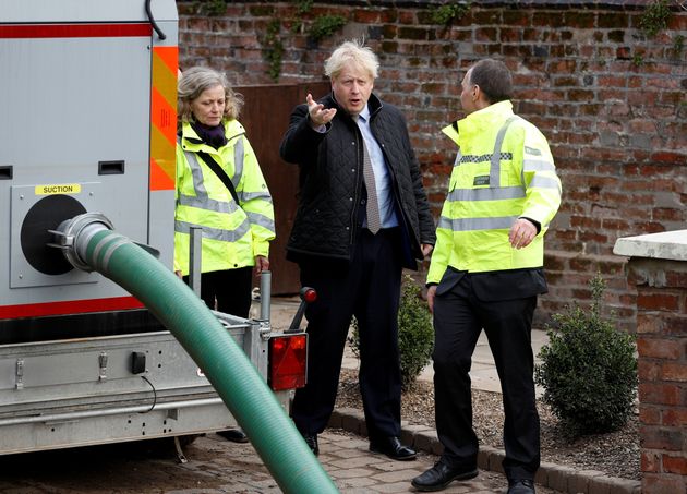 Hecklers Brand Boris Johnson A Traitor During Visit To Flood-Hit Town