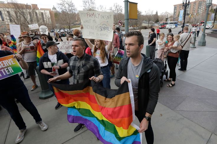 Several hundred Brigham Young University students protested Friday to show their displeasure with a letter this week that clarified that "same-sex romantic behavior" is not allowed on campus. 