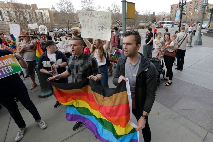 Several hundred Brigham Young University students protested Friday to show their displeasure with a letter this week that clarified that "same-sex romantic behavior" is not allowed on campus.