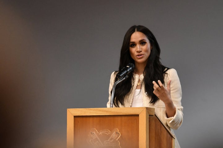 The Duchess of Sussex speaks during a school assembly as part of a visit to Robert Clack School in Essex on March 6, in suppo