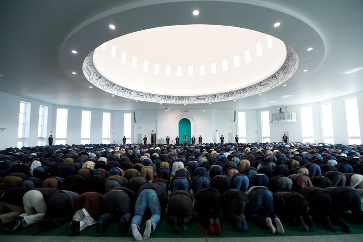 Worshippers attend Friday prayers in the Baitul Futuh Mosque.