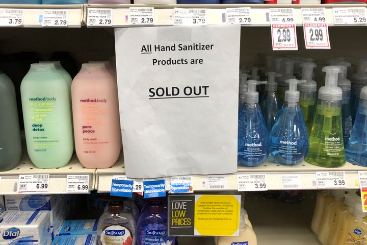 A sign on a shelf at a grocery store in Kirkland, Wash., advises shoppers on March 3 that all hand sanitizer products are sol