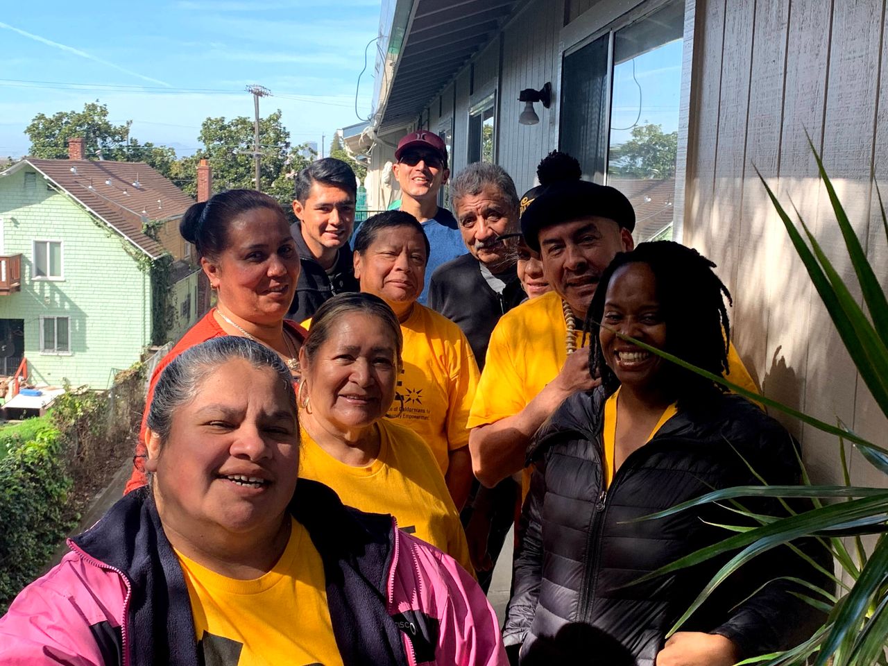 Perez with some of his fellow rent strikers and ACCE staff including Israel Lepiz (pictured back, left) and ACCE Oakland director Carroll Fife (pictured front, right).