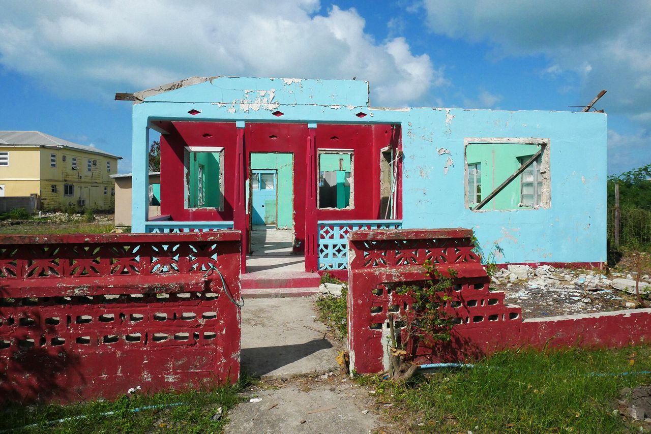 Hurricane Irma destroyed 95% of the island’s buildings and infrastructure in September 2017. Sights like this one of destroyed homes as well as businesses are seen across the island.