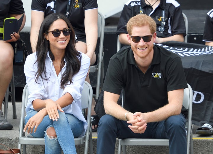 Meghan Markle and Prince Harry attend wheelchair tennis at the Invictus Games on Sept. 25, 2017, in Toronto.