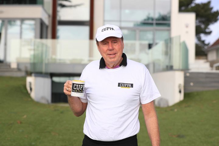 Harry poses with his CUPPA merchandise