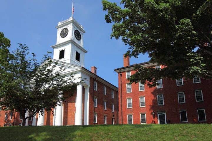 Daytime view of the the Johnson Chapel standing at the center of College Row on the Amherst College campus.