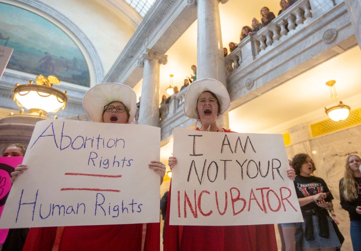 Women protest against abortion bans at the State Capitol Building in Salt Lake City, Utah, on May 21, 2019.