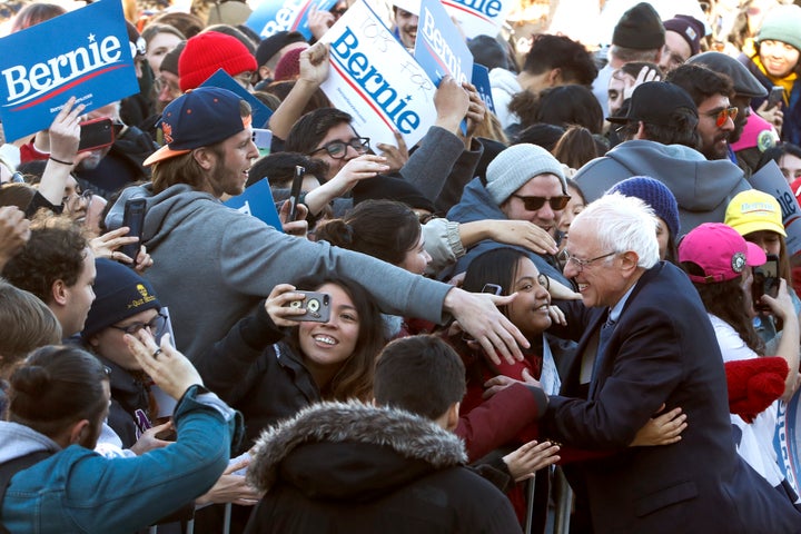 Sanders got a hug as he worked the crowd after a campaign rally in Chicago's Grant Park on Saturday.