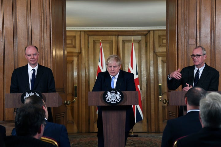 From left, Chief Medical Officer for England Chris Witty, Britain's Prime Minister Boris Johnson and Chief Scientific Adviser