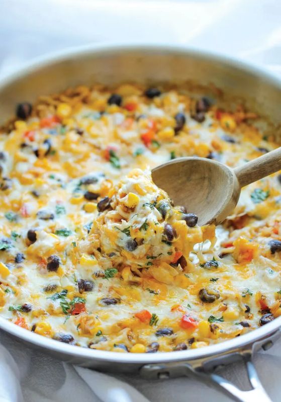 Get the Cheesy Enchilada Rice Skillet recipe from Damn Delicious