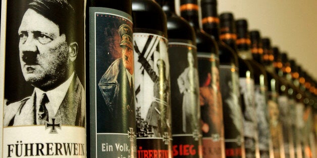 UDINE, ITALY- SEPTEMBER, 12: Bottles of wine with labels depicting Nazi leader Adolf Hitler sit on a shelf in the cellar of 'Lunardelli Wine' September 12, 2003 in Collaredo di Prato near Udine, Italy. The German government has asked the Italian government to investigate whether the labels on Lunardelli's wine, which depict many infamous Nazis, contravene a European Union resolution on combating the spread of racist images and literature. The wine?s sale is illegal in Germany, where products bearing images or slogans from the Nazi era are outlawed. (Photo by Giuseppe Cacace/Getty Images)