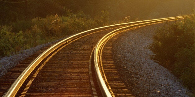 Evening light shining on railway track