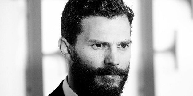 LONDON, ENGLAND - FEBRUARY 12: (EDITORS NOTE: Image has been converted to black and white. SUN NEWSPAPER OUT. MANDATORY CREDIT PHOTO BY DAVE J. HOGAN GETTY IMAGES REQUIRED) Jamie Dornan attends the UK Premiere of 'Fifty Shades Of Grey' at Odeon Leicester Square on February 12, 2015 in London, England. (Photo by Dave J Hogan/Getty Images)