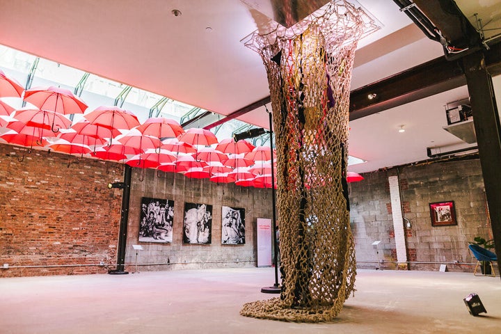 “InVocation,” by Japanese American artist Midori, is constructed with hemp rope, into which personal objects