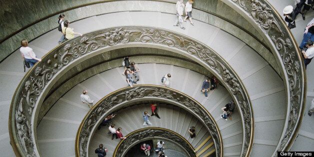 Italy, Rome, Vatican Museum, tourists on staircase, elevated view