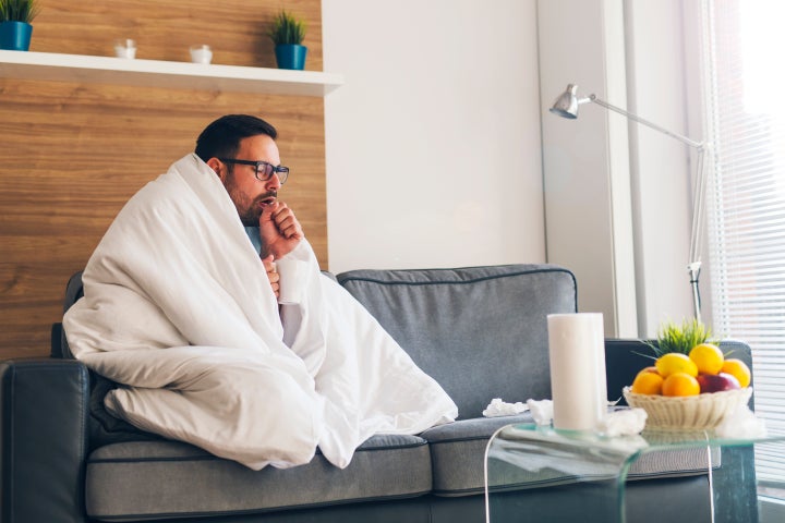 A dry cough is one of the symptoms of COVID-19.