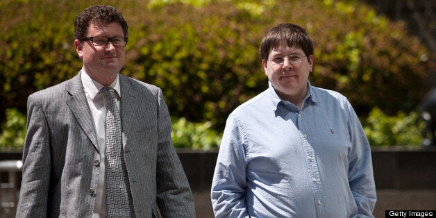 SACRAMENTO - APRIL 23: Former Reuters social media editor Matthew Keys (R) arrives at the federal courthouse April 23, 2013 in Sacramento, California. Keys was in court to face charges he conspired with the hacking group Anonymous. (Photo by Max Whittaker/Getty Images)