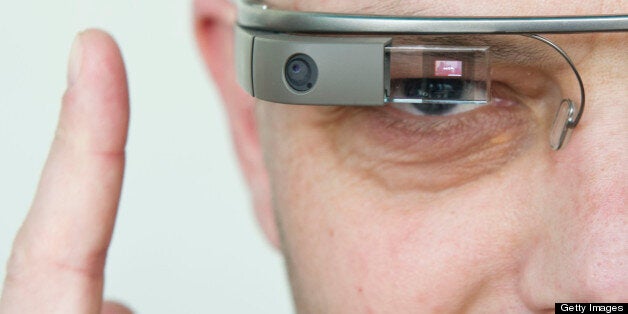 A visitor of the 'NEXT Berlin' conference tries out the Google Glass on April 24, 2013 in Berlin. 'NEXT Berlin' describes its