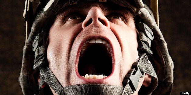 Portrait of US Military soldier screaming.