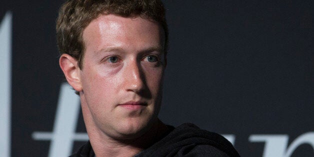 Mark Zuckerberg, founder and chief executive officer of Facebook Inc., listens to an audience member's question during an int