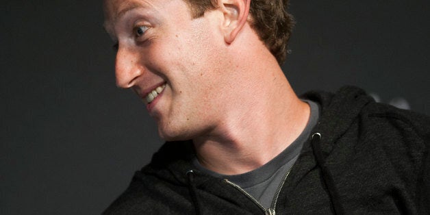 Facebook Founder and CEO Mark Zuckerberg speaks during an interview session with The Atlantic at the Newseum in Washington, DC, on September 18, 2013. AFP PHOTO/Jim WATSON (Photo credit should read JIM WATSON/AFP/Getty Images)