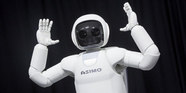 NEW YORK - APRIL 17: Honda Motors demonstrates its Asimo robot during a media preview of the 2014 New York International Auto Show in New York. The show opens with a sneak preview to the public April 18th and runs through April 27th. (Photo by Eric Thayer/Getty Images)