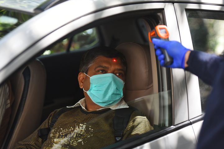 A man goes through thermal screening amid the coronavirus scare, at Hindustan Times House, KG Marg, on March 9, 2020 in New Delhi.