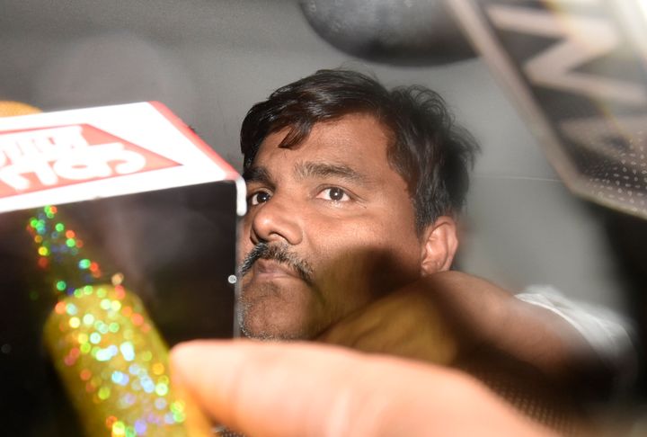 Suspended AAP councillor Tahir Hussain leaves from Sunlight Police Station to produce at Karkardooma Court, in New Delhi, Friday, March 6, 2020. 