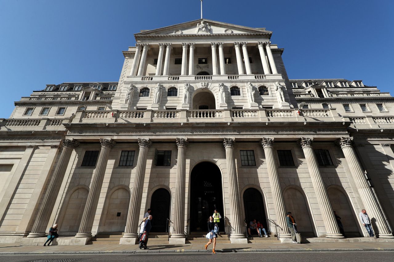The Bank of England, in the City of London, which has announced that it has cut its main interest rate to 0.25% from 0.75%.