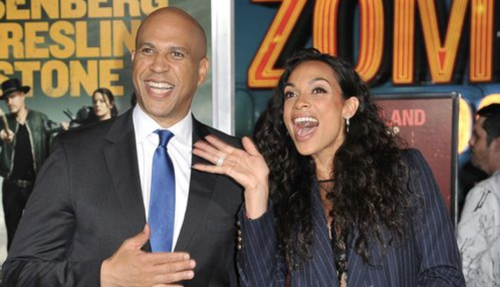 Cory Booker and Rosario Dawson, all smiles at a premiere for Dawson's movie "Zombieland: Double Tap." 