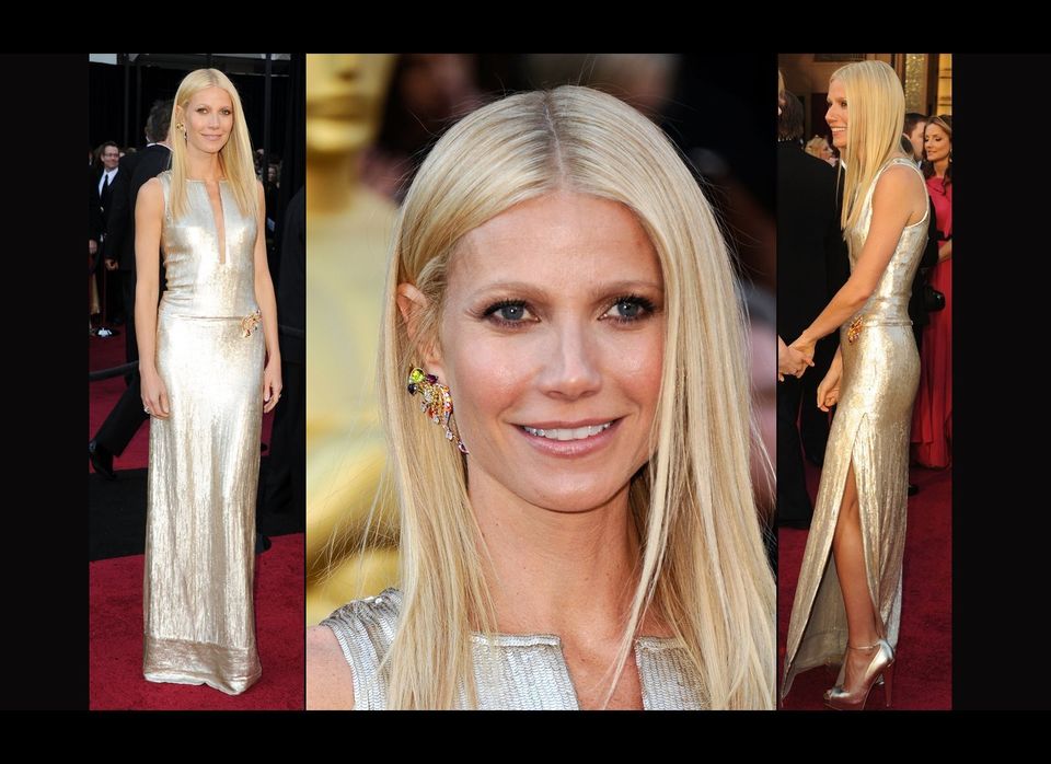 Gwyneth Paltrow in Calvin Klein dress and Louis Vuitton brooch and earrings