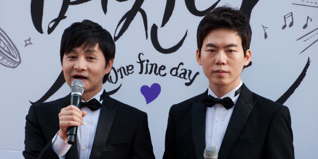 SEOUL, SOUTH KOREA - SEPTEMBER 07: Same-sex couple Kim Jho Gwang-Soo and Kim Seung-Hwan attend their marriage press conference on September 7, 2013 in Seoul, South Korea. (Photo by Choi Soo-Young/Multi-Bits via Getty Images)