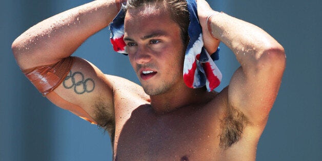 BARCELONA, SPAIN - JULY 28: Tom Daley of Great Britain looks on during the Men's 10m Platform Diving final on day nine of the 15th FINA World Championships at Piscina Municipal de Montjuic on July 28, 2013 in Barcelona, Spain. (Photo by Clive Rose/Getty Images)