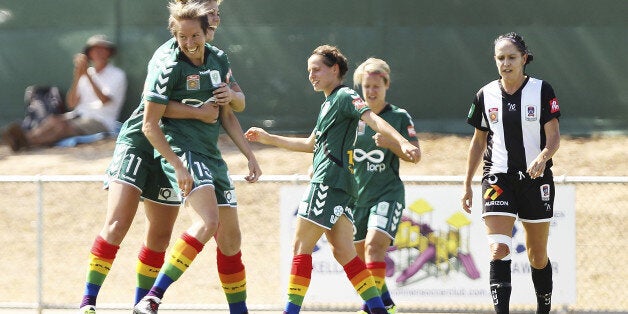 CANBERRA, AUSTRALIA - FEBRUARY 01: Sally Shipard of Canberra United is congratulated by team mates after scoring a goal during the round 11 W-League match between Canberra United and the Newcastle Jets at McKellar Park on February 1, 2014 in Canberra, Australia. (Photo by Stefan Postles/Getty Images)