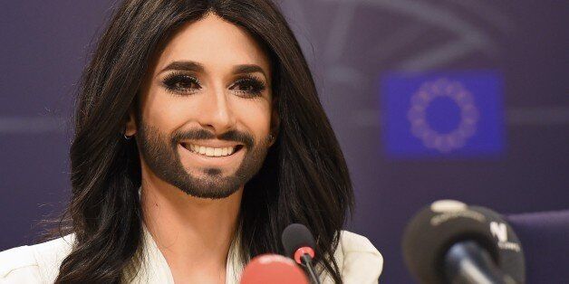 Transvestite Eurovision winner Conchita Wurst addresses a press conference at the European Parliament in Brussels, on October 8, 2014. Wurst will perform in front of the European Parliament building in Brussels on October 8, and European lawmaker Ulrike Lunacek, one of five MEPs from five different factions who invited Wurst to perform, said that the hour-long concert was part of a campaign to fight discrimination. AFP PHOTO/Emmanuel Dunand (Photo credit should read EMMANUEL DUNAND/AFP/Getty Images)