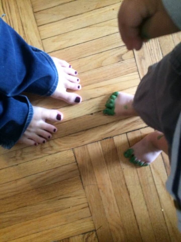 A post-pedicure photo of the author, Kat Rossi (left), and her son