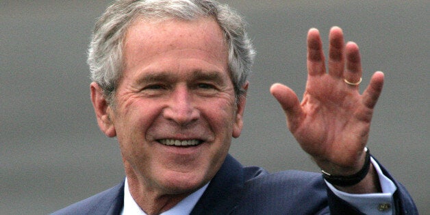 UNITED KINGDOM - JUNE 16: U.S. President George W. Bush waves upon arrival at RAF Aldgerove in Belfast, Northern Ireland, on