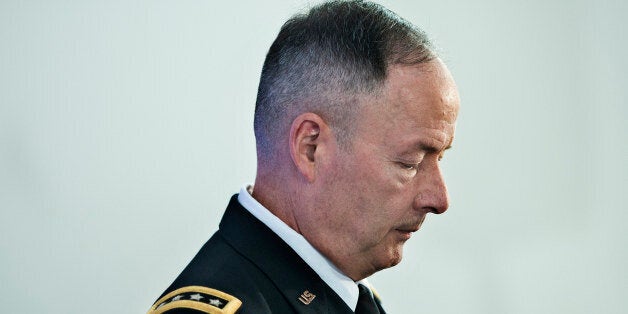 General Keith Alexander, Director of the National Security Agency and Commander of the US Cyber Command, speaks during a discussion at the Reagan Building October 30, 2013 in Washington, DC. The discussion, sponsored by Bloomberg Government, focus on the costs and benefits of cyber security. AFP PHOTO/Brendan SMIALOWSKI (Photo credit should read BRENDAN SMIALOWSKI/AFP/Getty Images)