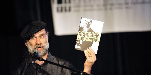 US computer security specialist Bruce Schneier gives a lecture during the largest computer hackers' conference in eastern Europe, the 'Hacktivity' in Budapest on September 18, 2010. Hacktivity 2010, the largest computer hackers' conference in eastern Europe, kicked off on September 18, with some 1,000 participants expected to attend the two-day event, according to organisers. The conference was to bring together officials and computer experts from Hungary and abroad in an informal setting, combining lectures and discussions on serious issues such as Internet security, with lighter fare and games. Bruce Scheier, a world-renowned cyber security expert, opened the congress with a keynote speech. AFP PHOTO / ATTILA KISBENEDEK (Photo credit should read ATTILA KISBENEDEK/AFP/Getty Images)