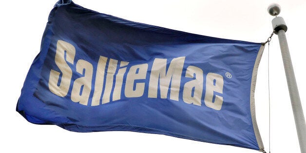 UNITED STATES - APRIL 16: A flag flies outside a Sallie Mae building in Reston, Virginia, a suburb of Washington D.C., Monday, April 16, 2007. SLM Corp., known as Sallie Mae, accepted a $25 billion takeover bid from a group led by J.C. Flowers & Co., taking private the largest U.S. provider of student loans. (Photo by Carol T. Powers/Bloomberg via Getty Images)