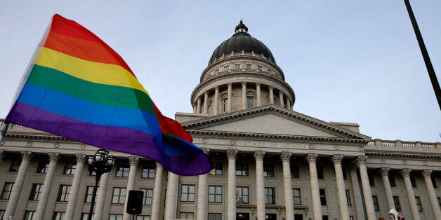 SLAT LAKE CITY, UT - JANUARY 28: Supporters hold a pro-gay marriage rally outside the Utah State Capitol on January 28, 2014 in Salt Lake City, Utah. Several weeks ago a federal judge ruled unconstitutional a voter-approved ban on same-sex marriage in the state of Utah. The ruling has since been stayed and is working it's way through the legal system. (Photo by George Frey/Getty Images)