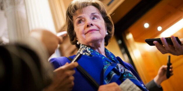 UNITED STATES - MARCH 11: Sen. Dianne Feinstein, D-Calif., chairman of the Senate Intelligence Committee, speaks with reporters in the Capitol after a speech on the Senate floor that accused the CIA of searching computers set up for Congressional staff for their research of interrogation programs. (Photo By Tom Williams/CQ Roll Call)