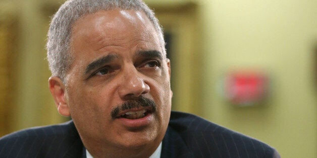 WASHINGTON, DC - APRIL 04: Attorney General Eric Holder testifies during a House Appropriations Committee hearing on Capitol Hill on April 4, 2014 in Washington, DC. The committee was hearing testimony from Holder the Department of Justice FY2015 budget request and other Justice Department related issues. (Photo by Mark Wilson/Getty Images)