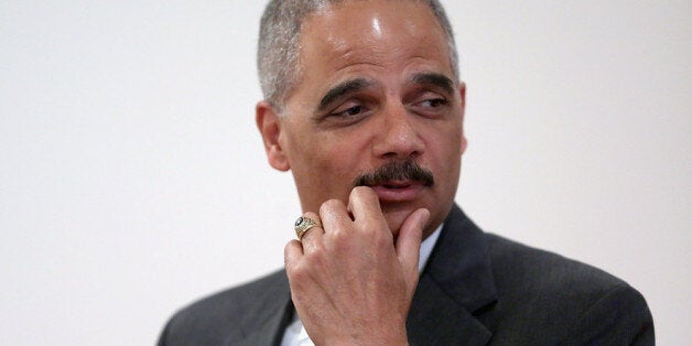 WASHINGTON, DC - APRIL 16: United States Attorney General Eric Holder addresses the Police Executive Research Forum's National Summit at the Mayflower Hotel April 16, 2014 in Washington, DC. Holder cited the rising number of overdose deaths from heroin and other dangerous opioids while talking about the Justice Department's effort to fight the crisis, including expanding first responders' access to the overdose-reversal drug naloxone. (Photo by Chip Somodevilla/Getty Images)