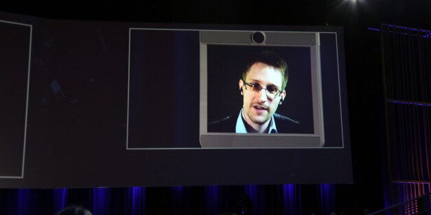 VANCOUVER, CANADA - MARCH 18: Edward Snowden is interviewed via a BEAM remote pressence system during the 2014 TED confernece March 18, 2014 in Vancouver, Canada. Snowden said the biggest revelations have yet to come out of the estimated 1.7 million documents he acquired from the National Security Agency. (Photo by Steven Rosenbaum/Getty Images)