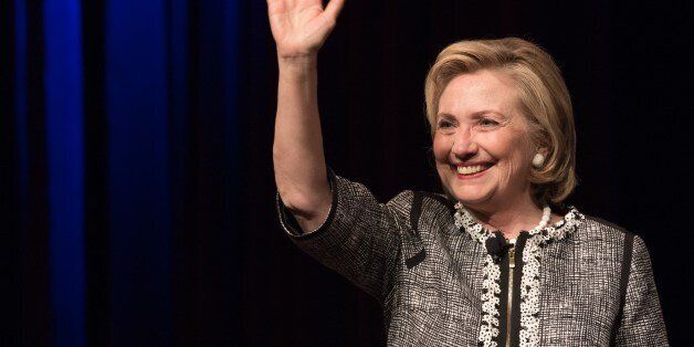 Former US Secretary of State Hillary Clinton waves after speaking about her new book 'Hard Choices' at the George Washington University in Washington on June 13, 2014. Clinton is widely thought to be mulling a run for the 2016 presidential election. AFP PHOTO/Nicholas KAMM (Photo credit should read NICHOLAS KAMM/AFP/Getty Images)