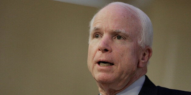 WASHINGTON, DC - JUNE 18: Sen. John McCain (R-AZ) participates in a discussion on the unfolding violence in Iraq on June 18, 2014 at the American Enterprise Institute for Public Policy Research in Washington, DC. The rise of the Islamic State in Iraq and Syria (ISIS) over the last year and a decline in the power of the government in Baghdad has led to questions of what America gained from its costly efforts in the region. (Photo by T.J. Kirkpatrick/Getty Images)