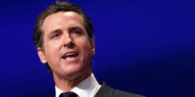 Lt. Gov. Gavin Newsom addresses delegates to the 2013 Democratic State Convention in Sacramento, Calif. on Friday, April 12, 2013. California Democrats are meeting this weekend to celebrate their November election victories and look ahead to next year, when they hope to solidify their grip on state politics. (AP Photo/Rich Pedroncelli)